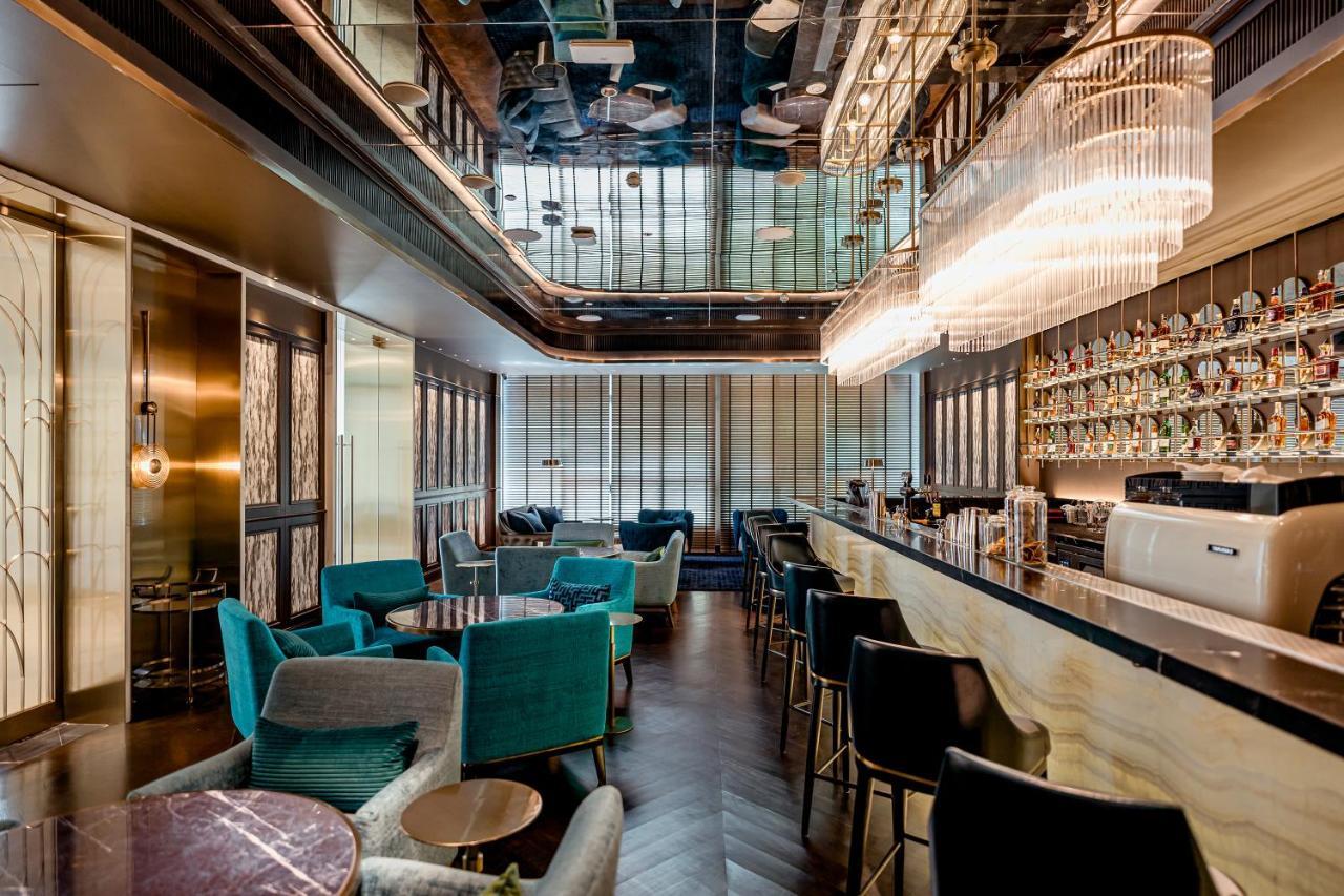 Silq Hotel & Residence, Managed By The Ascott Limited Bangkok Ngoại thất bức ảnh The bar at the 100 Queen's Gate