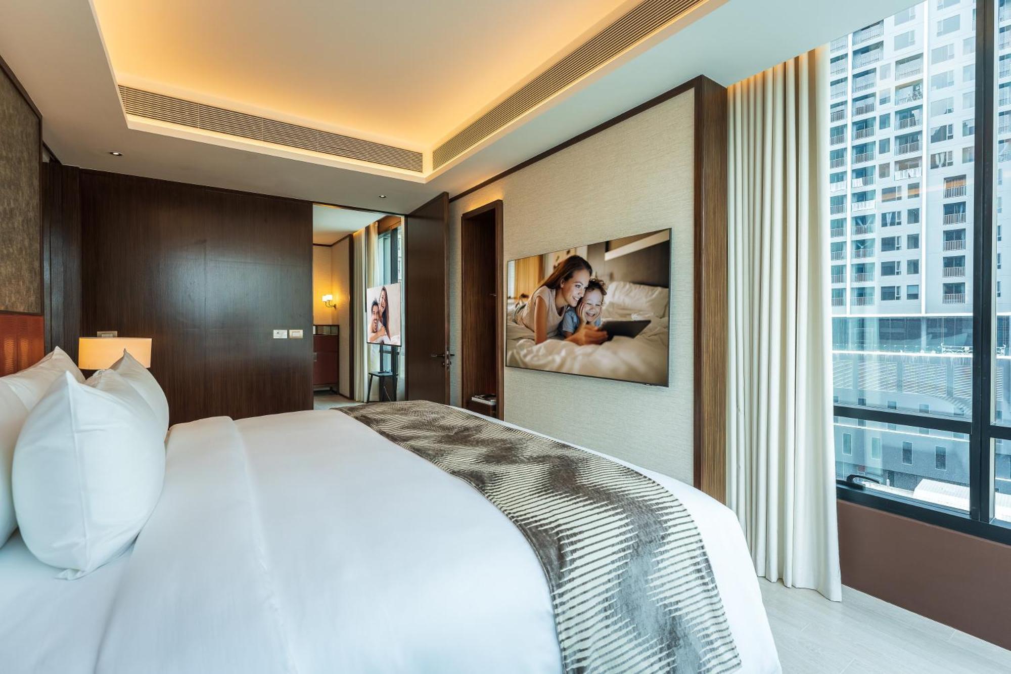 Silq Hotel & Residence, Managed By The Ascott Limited Bangkok Phòng bức ảnh A bedroom at the hotel