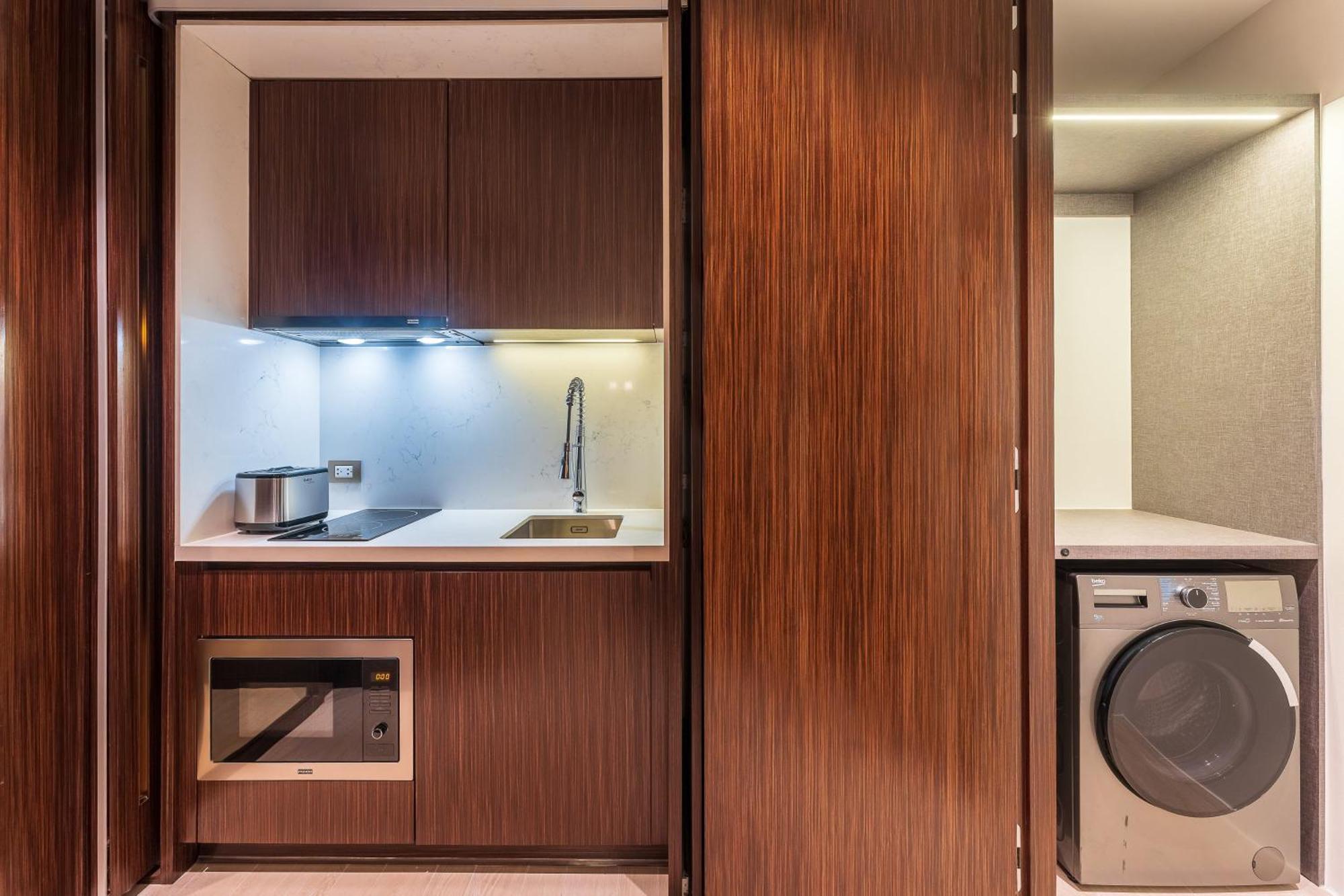 Silq Hotel & Residence, Managed By The Ascott Limited Bangkok Phòng bức ảnh A kitchen in a serviced apartment